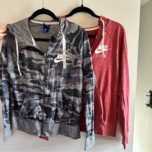BUNDLE NIKE ZIP UPS. Women’s size Medium. Full zip. Red and gray camo. Like new